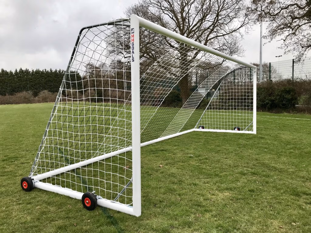 Wheeled freestanding football goals for sports facilities