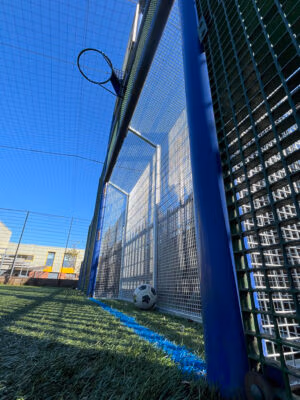 MUGA goal fencing system installation with bespoke ball stop cage and goal end protection