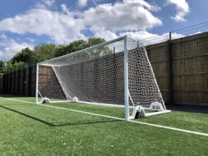Freestanding portable football goal with Revolution wheel system