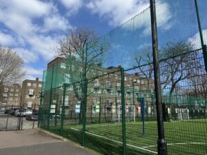 5m high MUGA ball stop netting extension installed above existing sports fencing