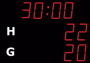 NHA4616 outdoor football LED scoreboard with top-mounted 46cm match clock, home and away score displays and NAUCON-1000 touchscreen controller.